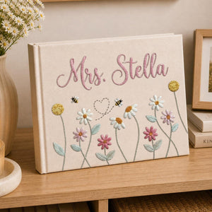 Personalized daisy bee hand embroidered linen notebook with floral meadow and custom name