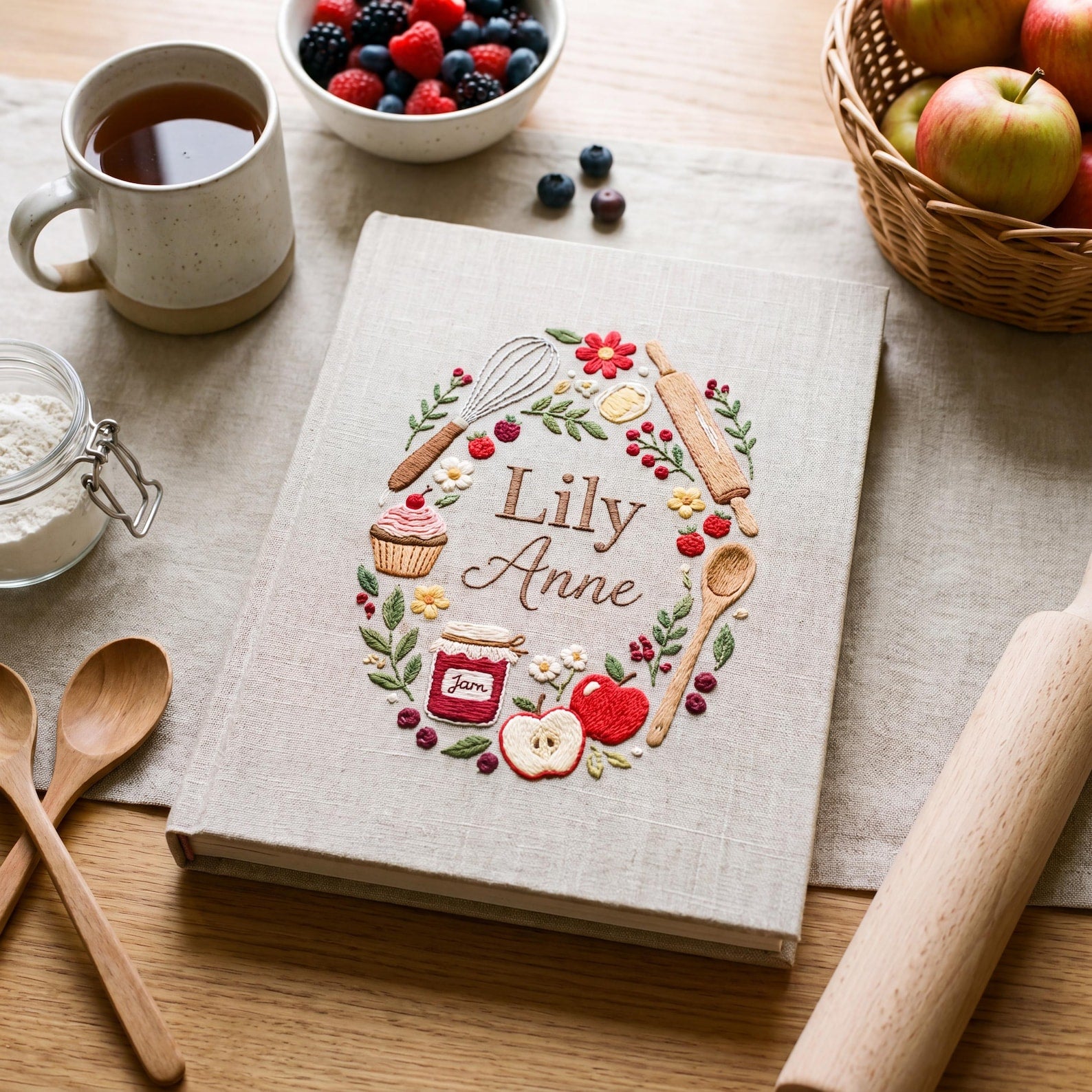 Personalized berry baking hand embroidered recipe book with strawberries lemons cupcake jam jar rolling pin and floral wreath embroidery
