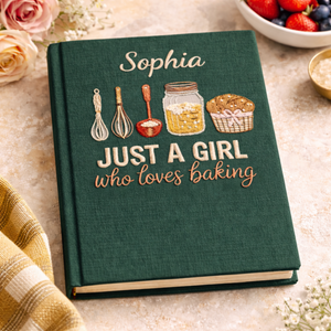 Personalized hand embroidered recipe book featuring baking tools, pantry ingredients, whisk illustrations, and rustic farmhouse baking-themed embroidery on a linen cover.