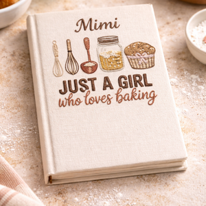 Personalized hand embroidered recipe book featuring baking tools, pantry ingredients, whisk illustrations, and rustic farmhouse baking-themed embroidery on a linen cover.