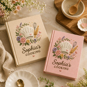 Personalized baker's garden hand embroidered recipe book featuring chef hat whisk rolling pin piping bag and floral embroidery on linen cover