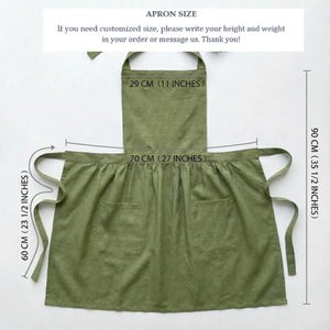 Personalized hand embroidered apron featuring blue wildflower embroidery and custom name on natural linen apron.